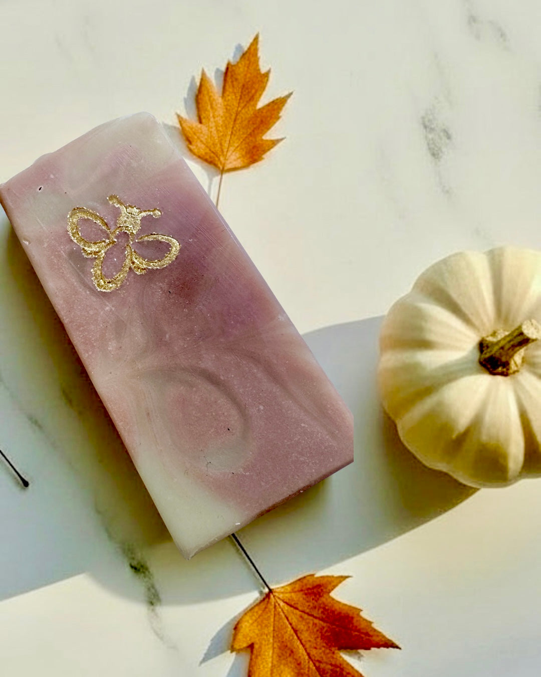 Bar soaps with white pumpkins on top