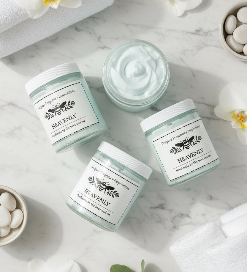Flat lay of 4 jars of light blue whipped body butter. one open showing the conents.