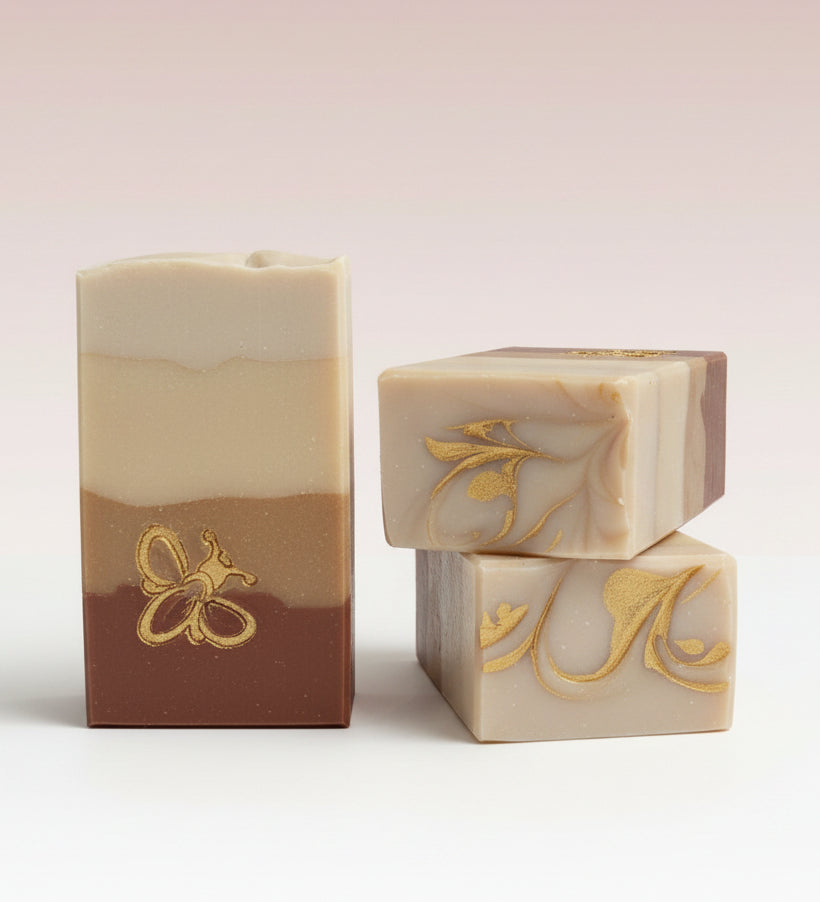 Luxury soap with gold accents on a white surface