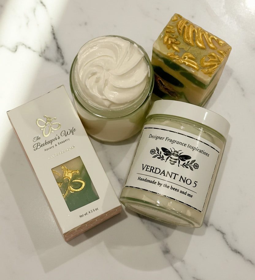 Jars of whipped body butter and soap with packaging 