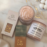 Two containers of body whip with a matching soap and beautiful packaging.